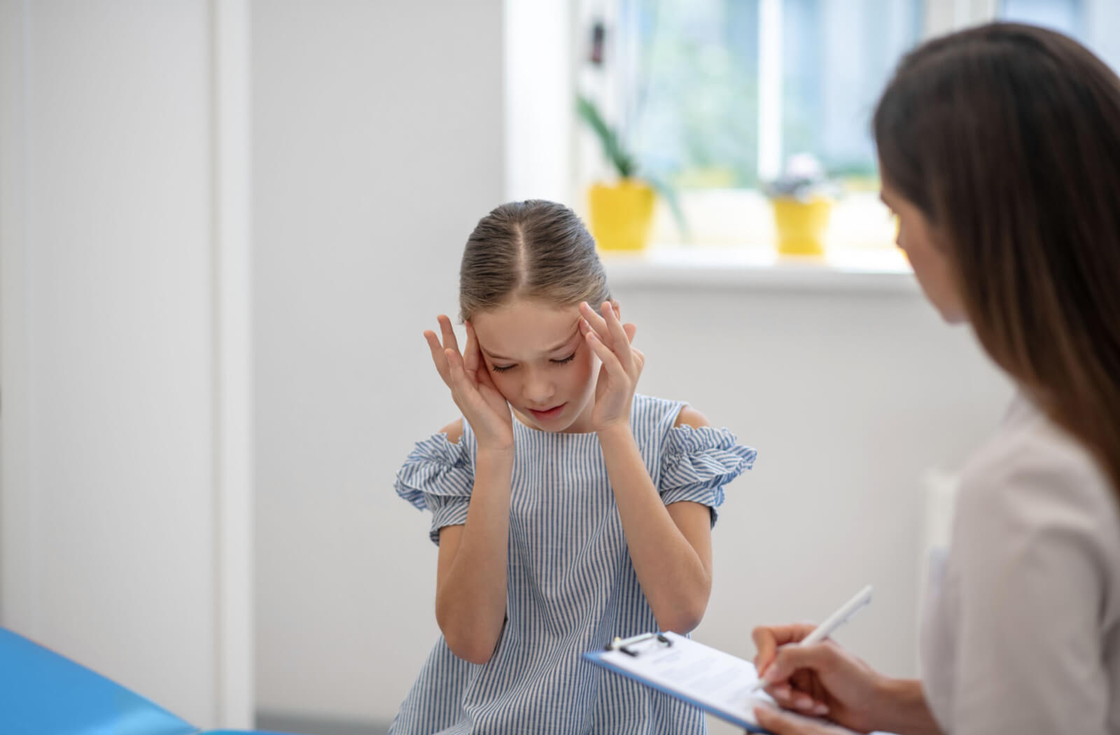 Why Is My Child Complaining of Eye Pain & Headaches?